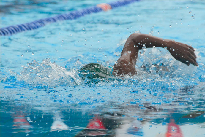 Swimmer in the swimming pool for fitness and health