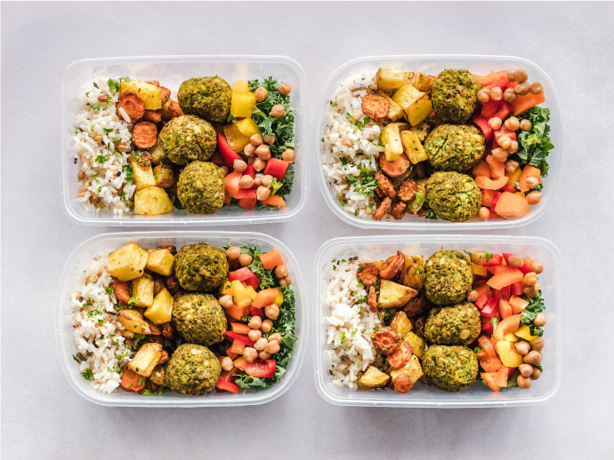 Healthy fresh meal in glass container meal prepped
